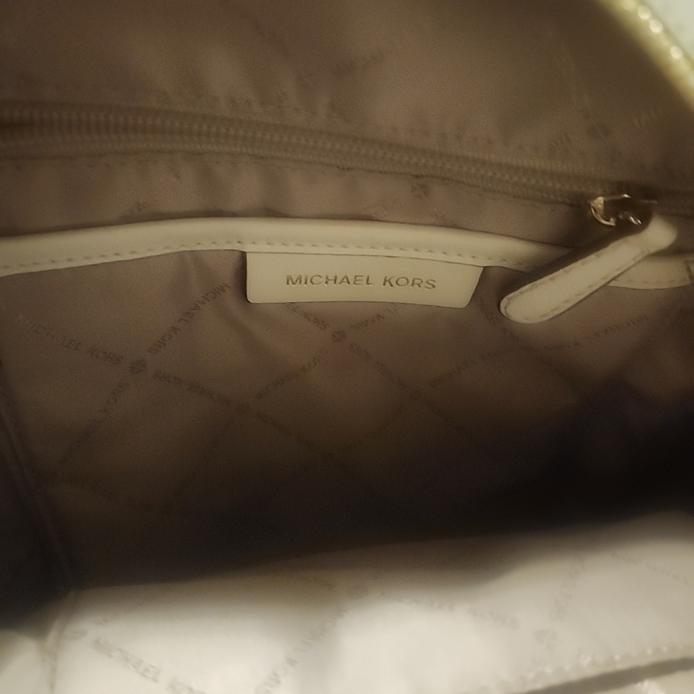 Michael Kors Cream Monogram Backpack with Gold Accents - Picture 15 of 16
